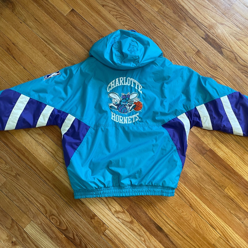 The essential STARTER 90s Charlotte Hornets Teal and Purple Jacket